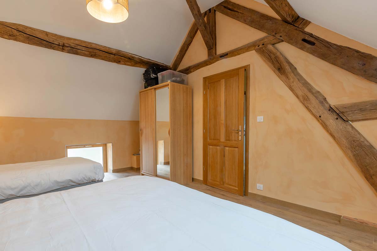 Exterior of L'Hirondelle gîte — enclosed grounds and private parking